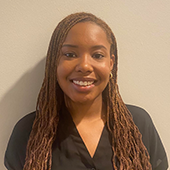 Student Metchersa Smith headshot against beige background